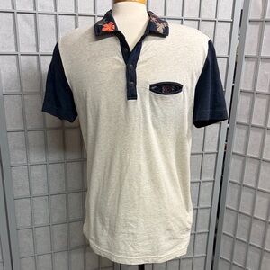 Tristan Cream Polo with Navy Sleeves and Floral Collar